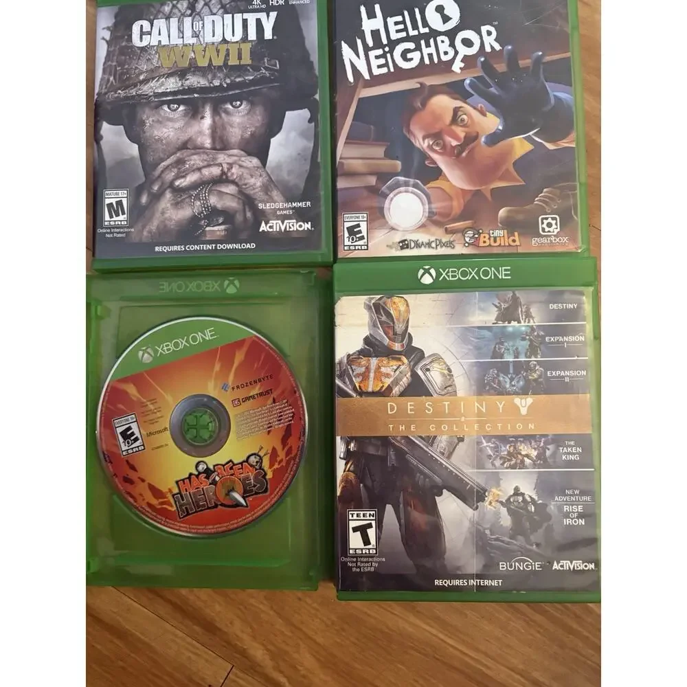 6 Xbox One games with a red wireless controller.